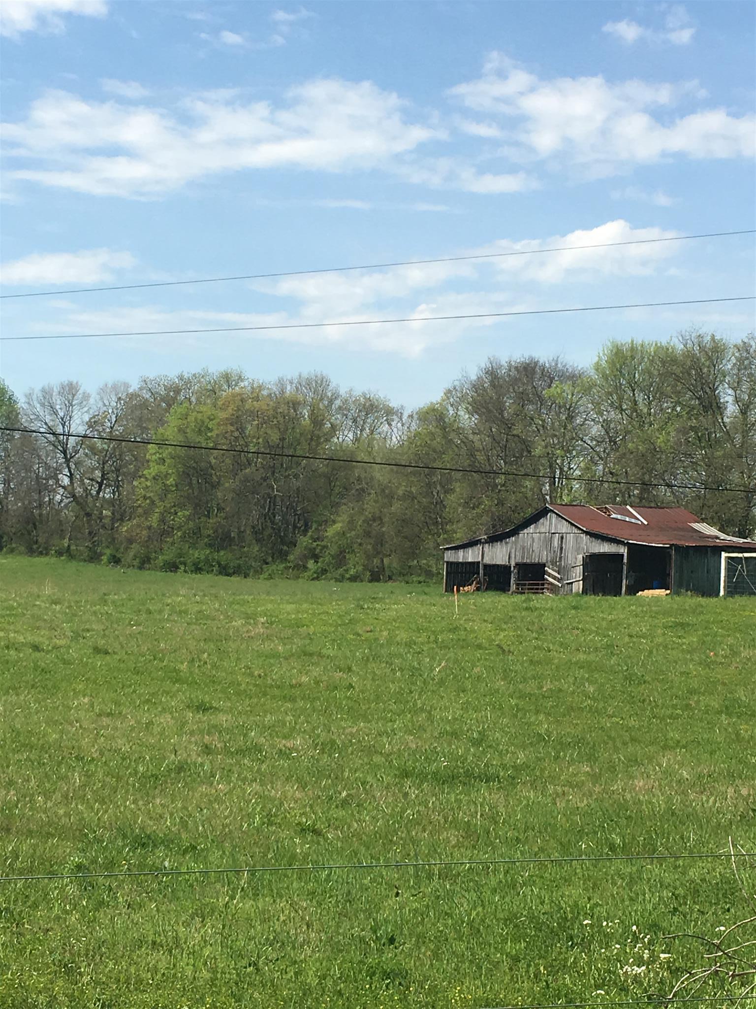 968 Academy Road Lebanon, TN 37087 - Photo 2 of 3 a view of a house with a yard