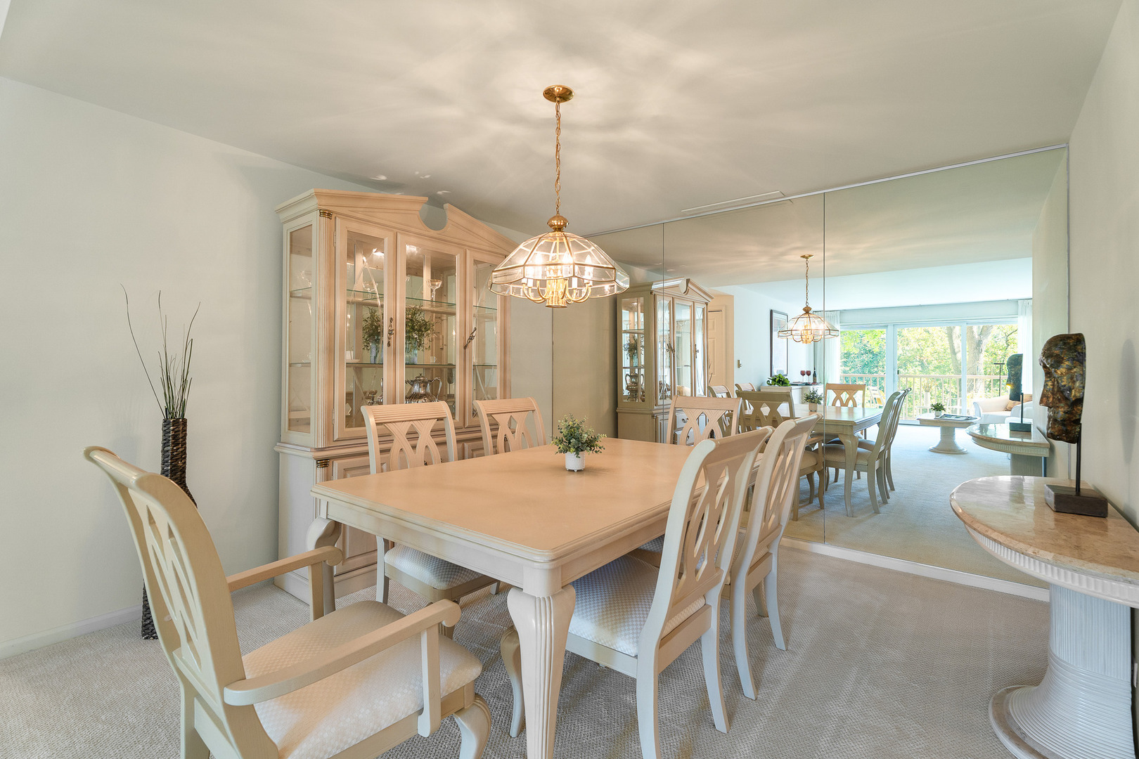 22 Park Lane, Unit 203 Park Ridge, IL 60068 - Photo 15 of 33 a dining room with furniture a chandelier and wooden floor