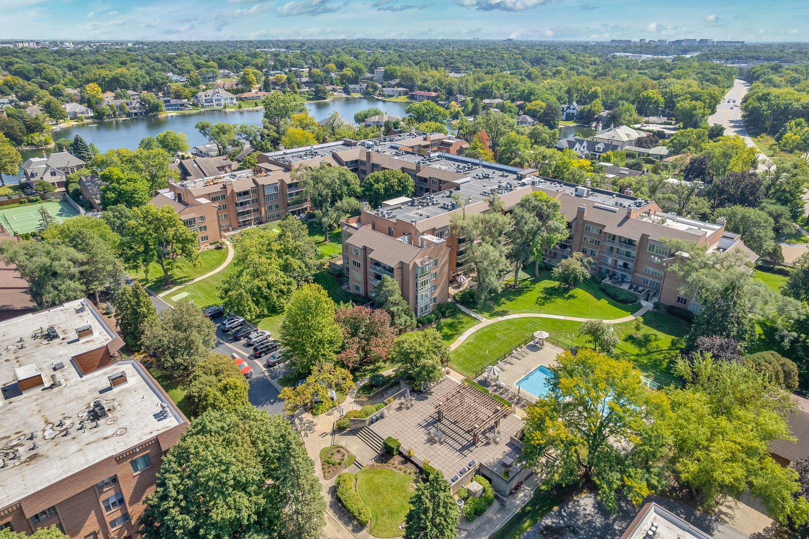 22 Park Lane, Unit 203 Park Ridge, IL 60068 - Photo 4 of 33 an aerial view of a house with a swimming pool yard and outdoor seating