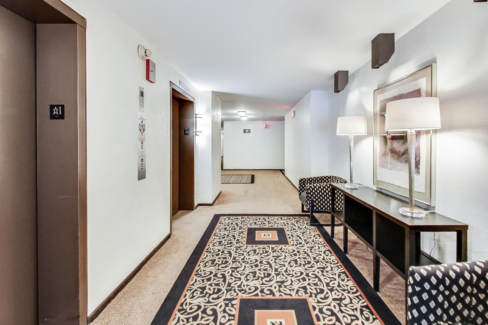 22 Park Lane, Unit 203 Park Ridge, IL 60068 - Photo 7 of 33 a bathroom with a sink and a mirror
