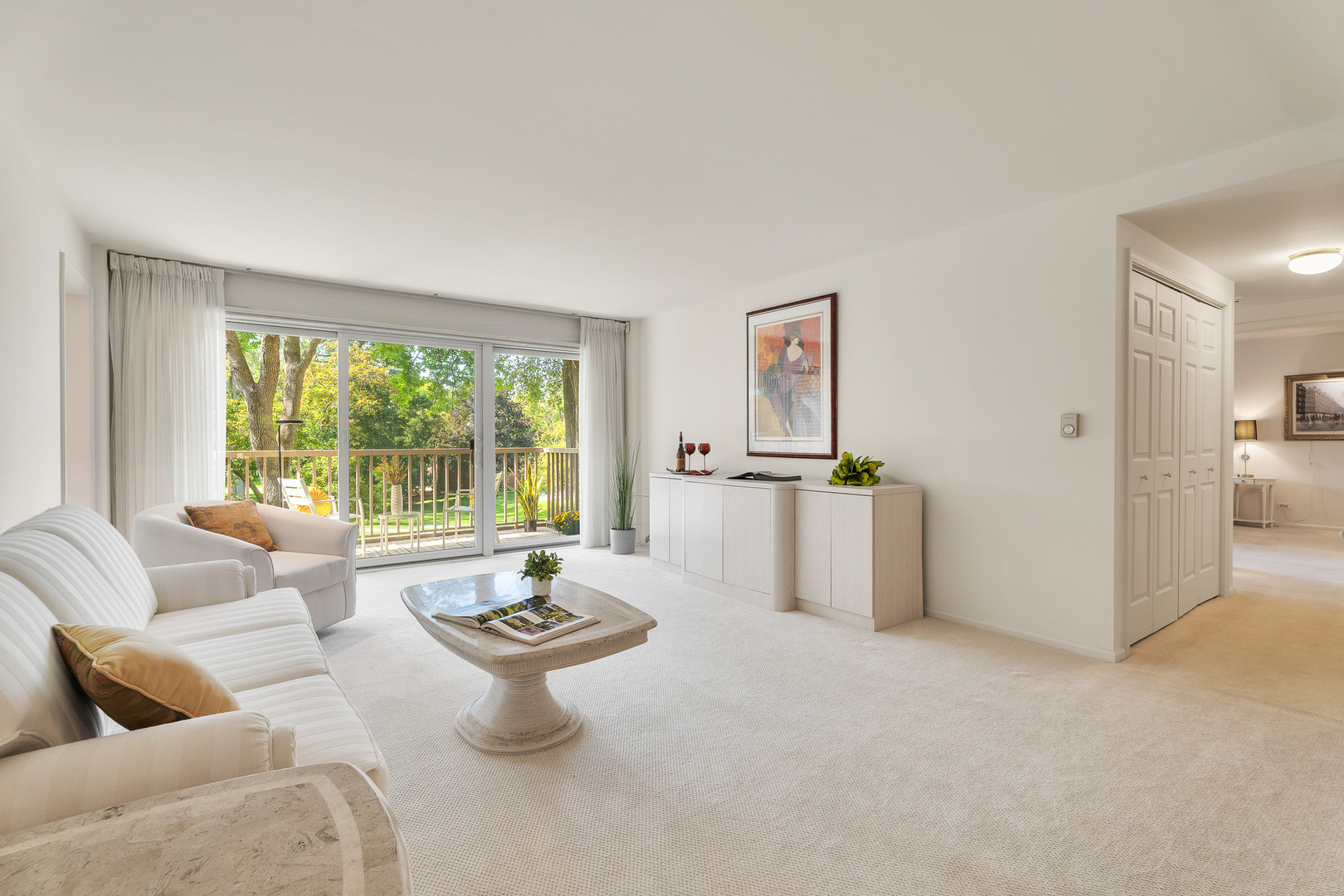 22 Park Lane, Unit 203 Park Ridge, IL 60068 - Photo 9 of 33 a living room with furniture and a large window