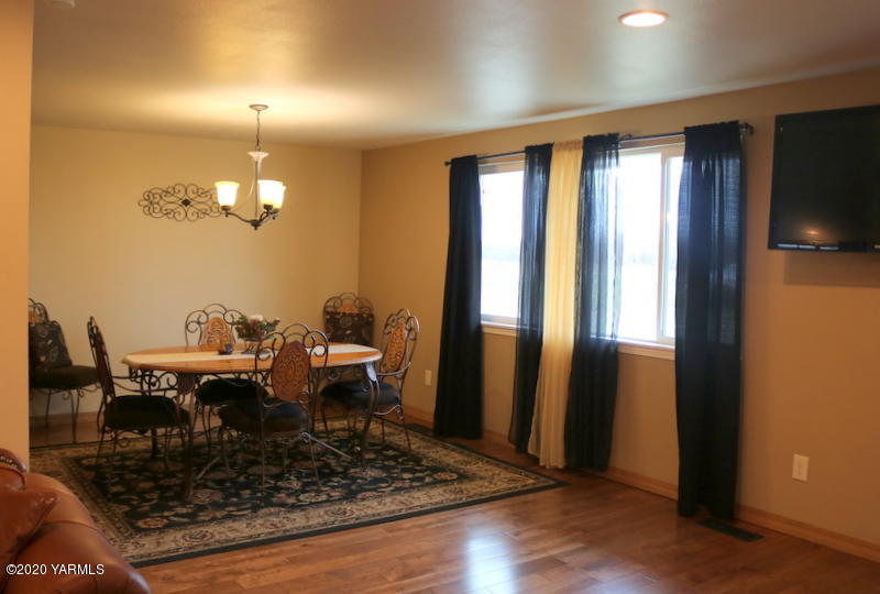 2491 Lateral 1 Road Wapato, WA 98951 - Photo 14 of 26 a very nice looking dining room with a table and chairs