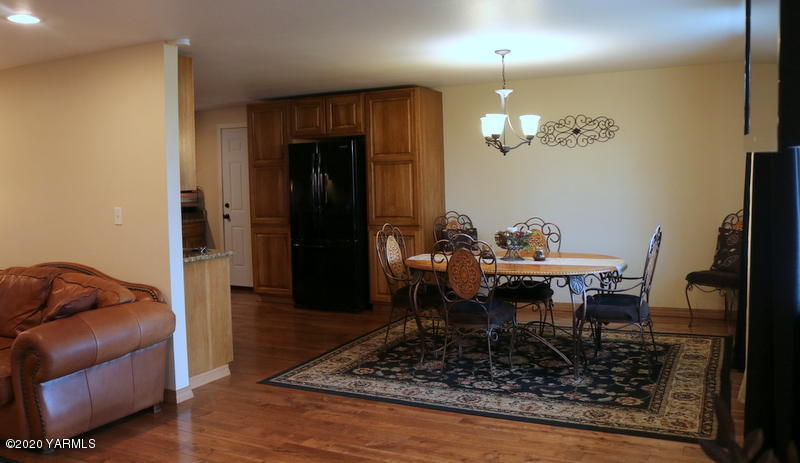 2491 Lateral 1 Road Wapato, WA 98951 - Photo 15 of 26 a view of a dining room with furniture
