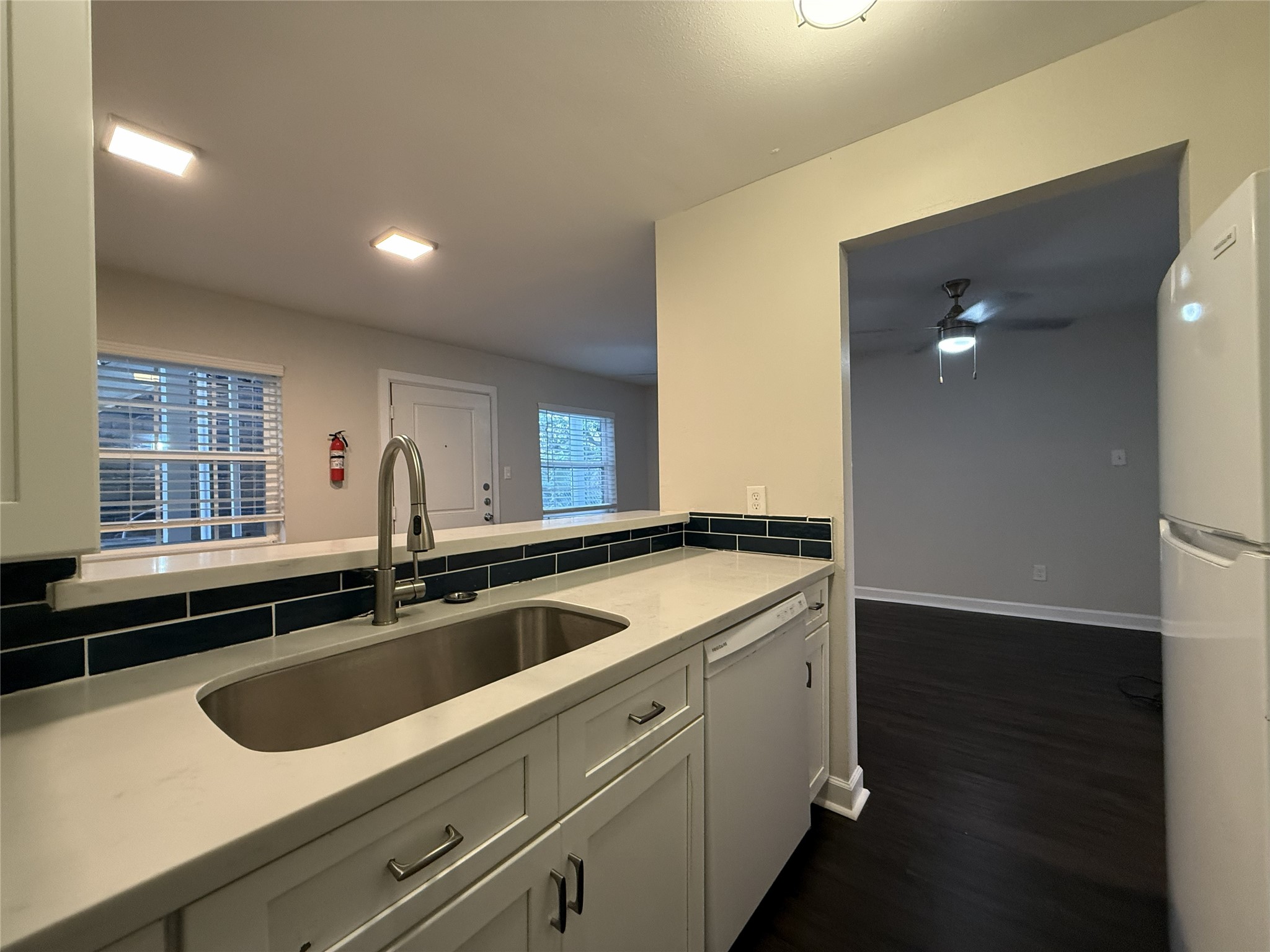 1824 Thonig Road, Unit 10 Houston, TX 77055 - Photo 7 of 17 a view of a sink a refrigerator and window