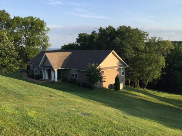 1520 Heller Ridge Spring Hill, TN 37174 - Photo 2 of 21 a house view with a garden space