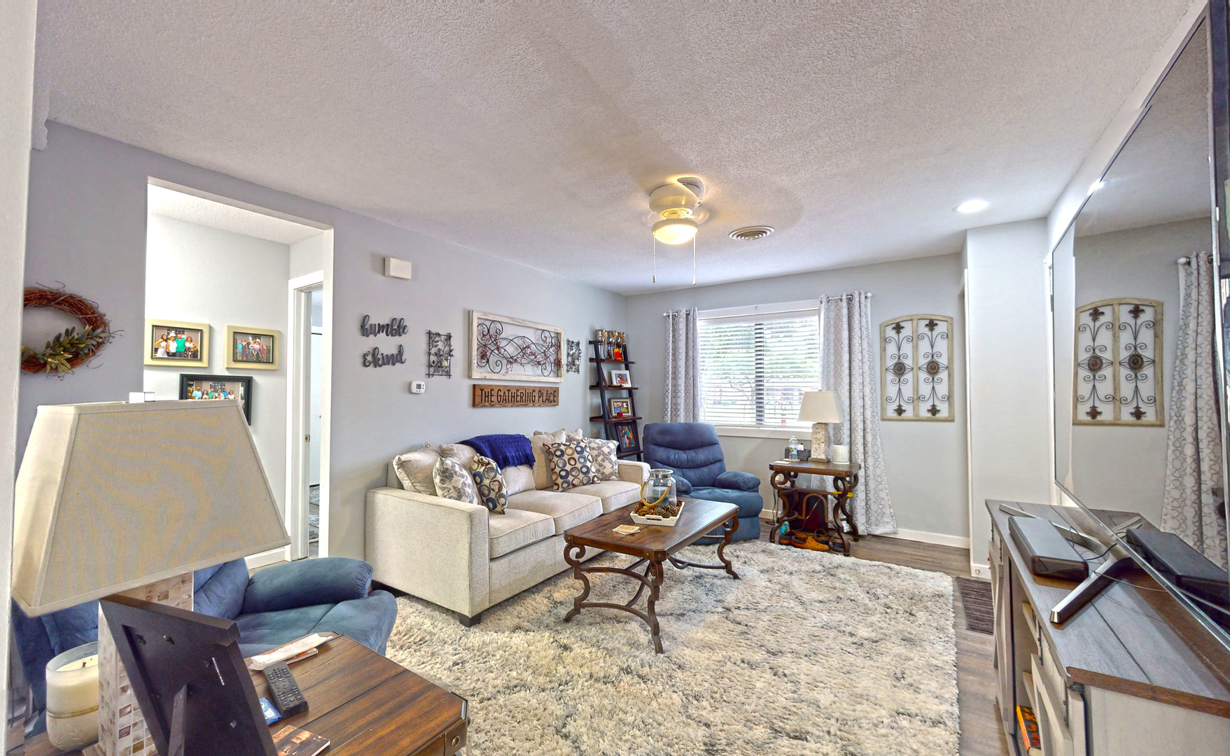 1204 Dean Drive, Unit 4 Urbana, IL 61802 - Photo 3 of 15 a living room with furniture and wooden floor
