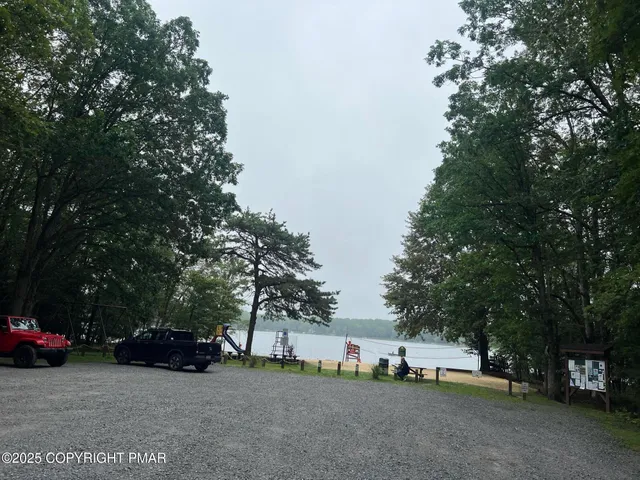 a view of street with parked cars