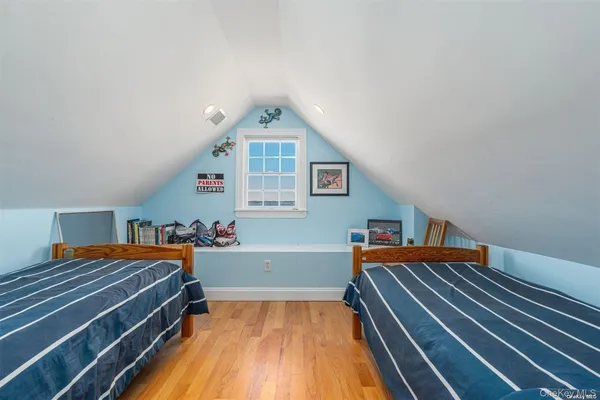 a room with stairs and a bed