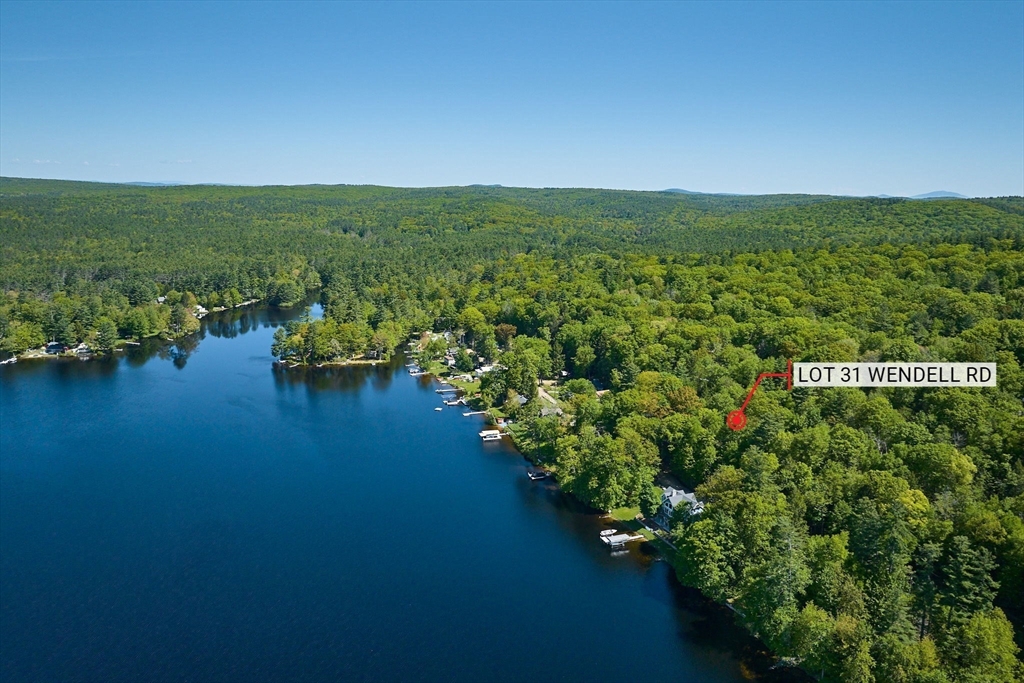 Lot 31 Wendell Road Shutesbury, MA 01072 - Photo 2 of 13 an aerial view of ocean with residential houses with outdoor space and seating