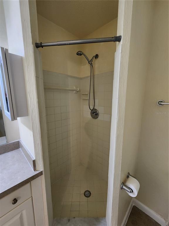 501 Southwest 75th Street, Unit A14 Gainesville, FL 32607 - Photo 42 of 56 a bathroom with a shower