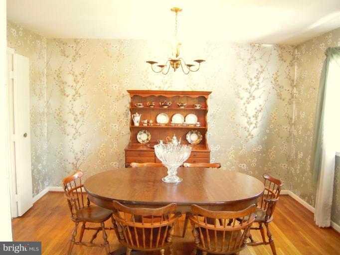 2715 Woodedge Road Silver Spring, MD 20906 - Photo 2 of 22 a view of a dining room with furniture and chandelier