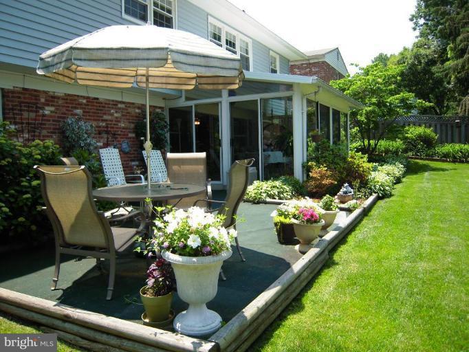 2715 Woodedge Road Silver Spring, MD 20906 - Photo 21 of 22 a view of two chairs and table in the patio