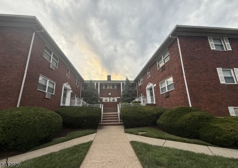 197 North Beverwyck Road, Unit 10 Lake Hiawatha, NJ 07034 - Photo 2 of 18 a view of a house with a yard