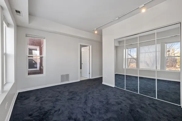 an empty room with windows