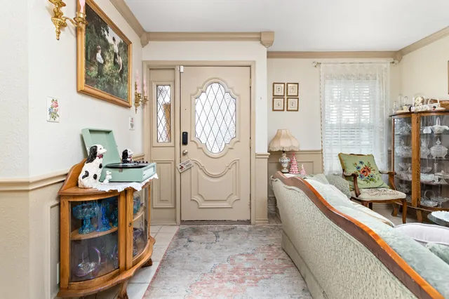 a room with fireplace a washer and a mirror