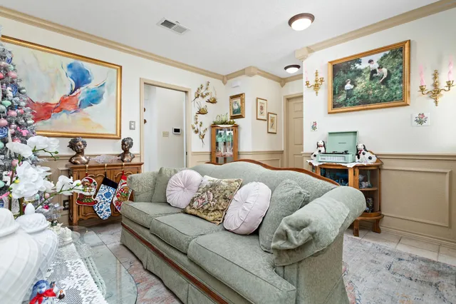 a bedroom with furniture and a couch