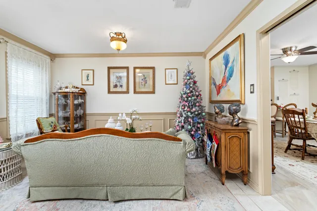 a bedroom with bed and musical instruments