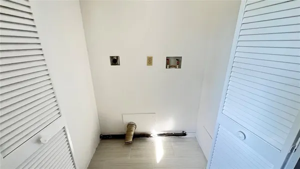 a view of small space with racks on the wall