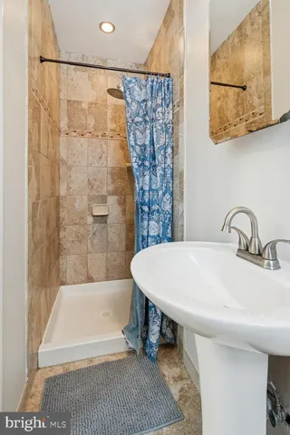 a bathroom with a sink and a bathtub