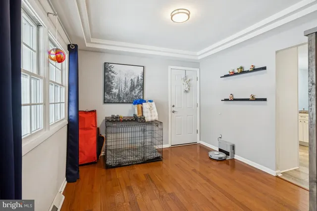 a view of room with cabinet and windows