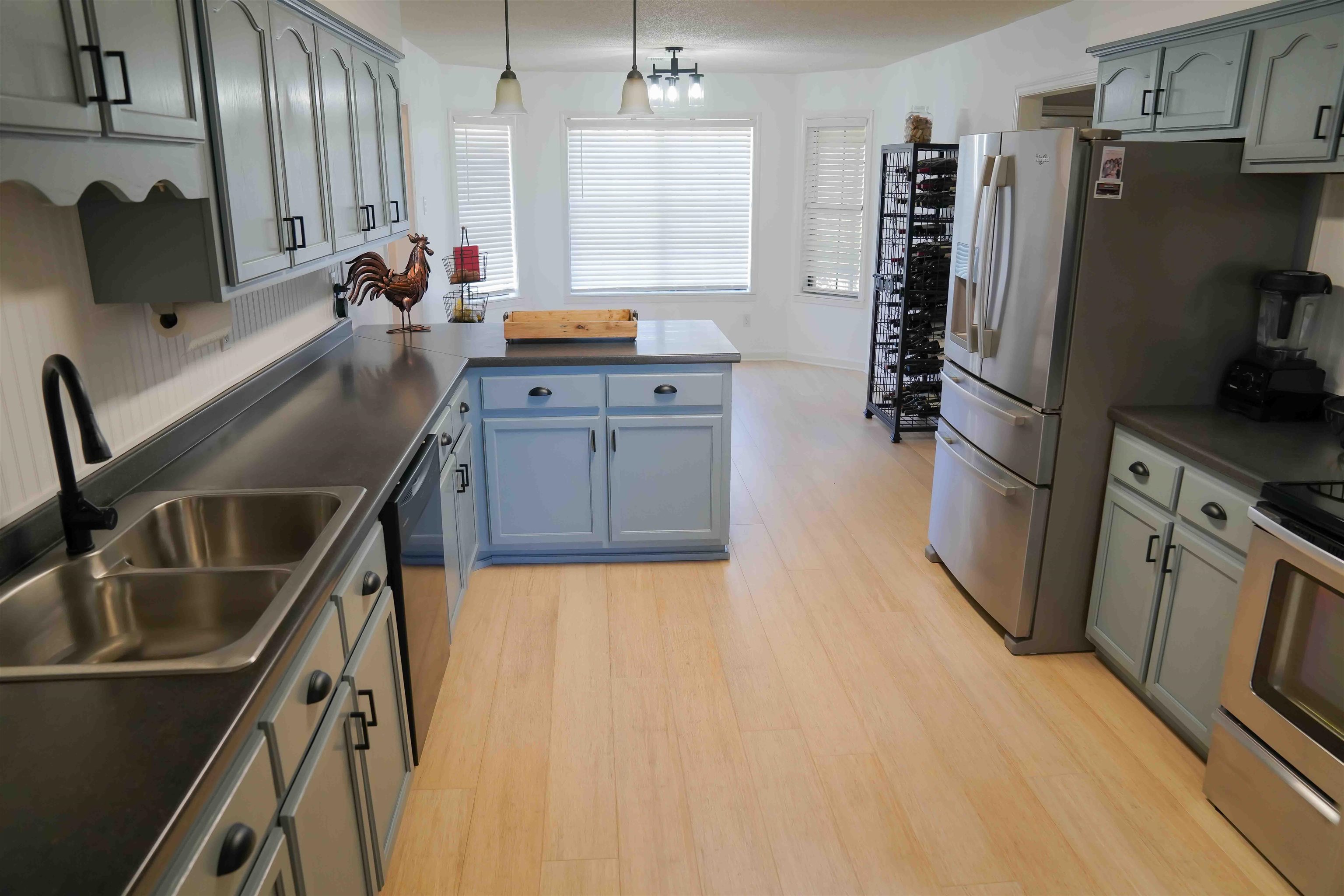 2210 Pickens Store Road Mason, TN 38049 - Photo 6 of 25 a kitchen with stainless steel appliances granite countertop a refrigerator a stove and a sink