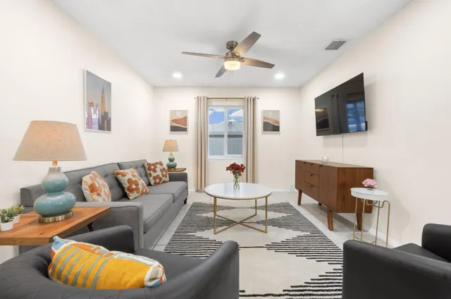 a view of an chairs and tables in the patio