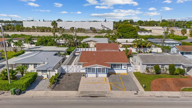 a view of balcony with wooden floor and fence