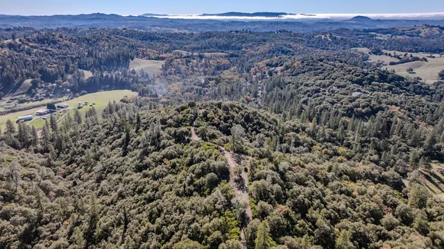 a view of a houses with a yard