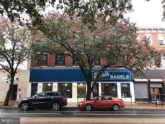 a car parked in front of a building