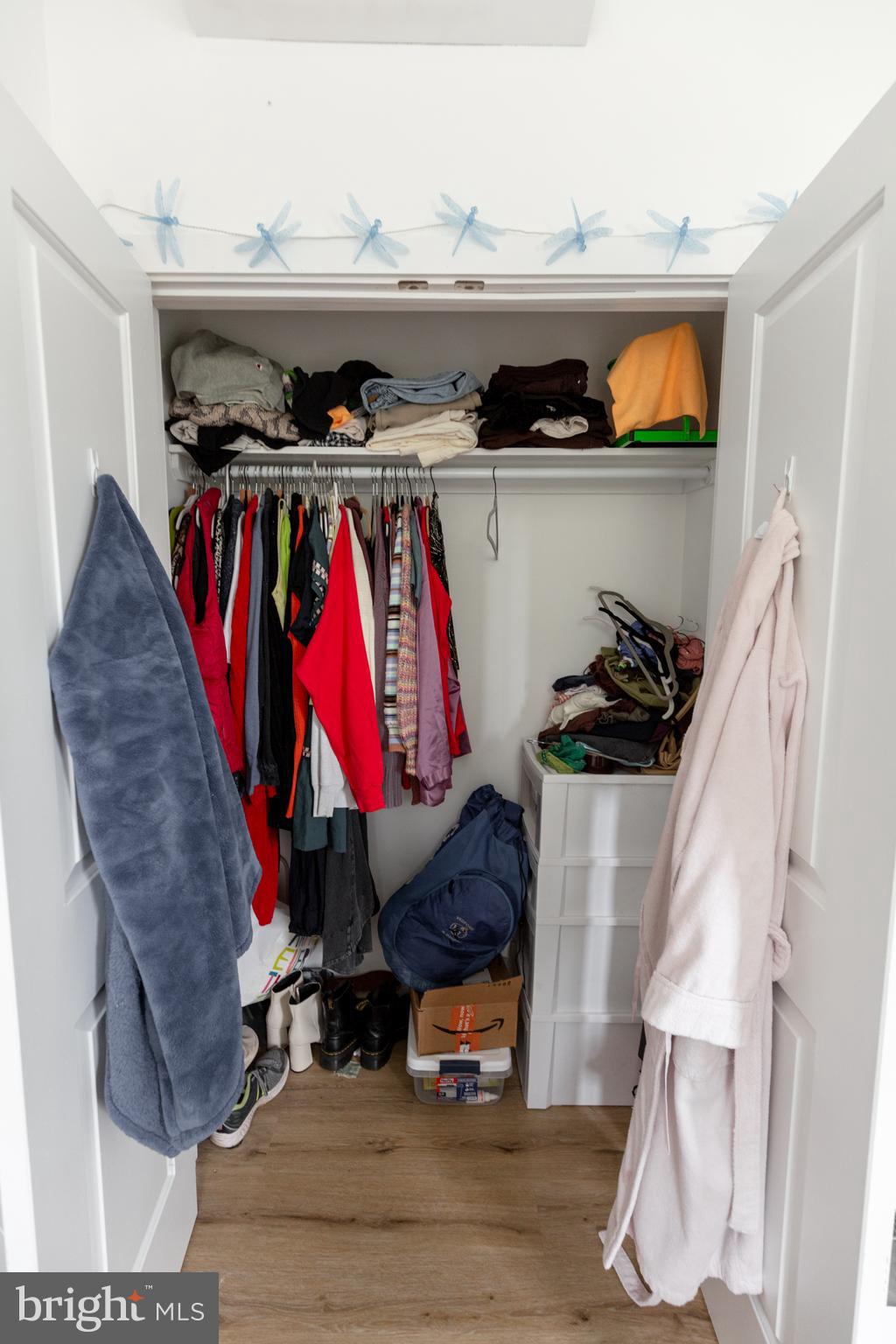 3945-49 Lancaster Avenue, Unit 3B Philadelphia, PA 19104 - Photo 23 of 28 a view of walk in closet with clothes and shoes