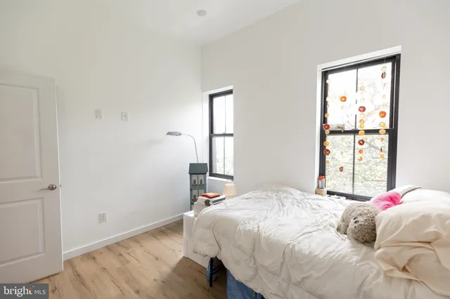 a room with furniture a washer and dryer