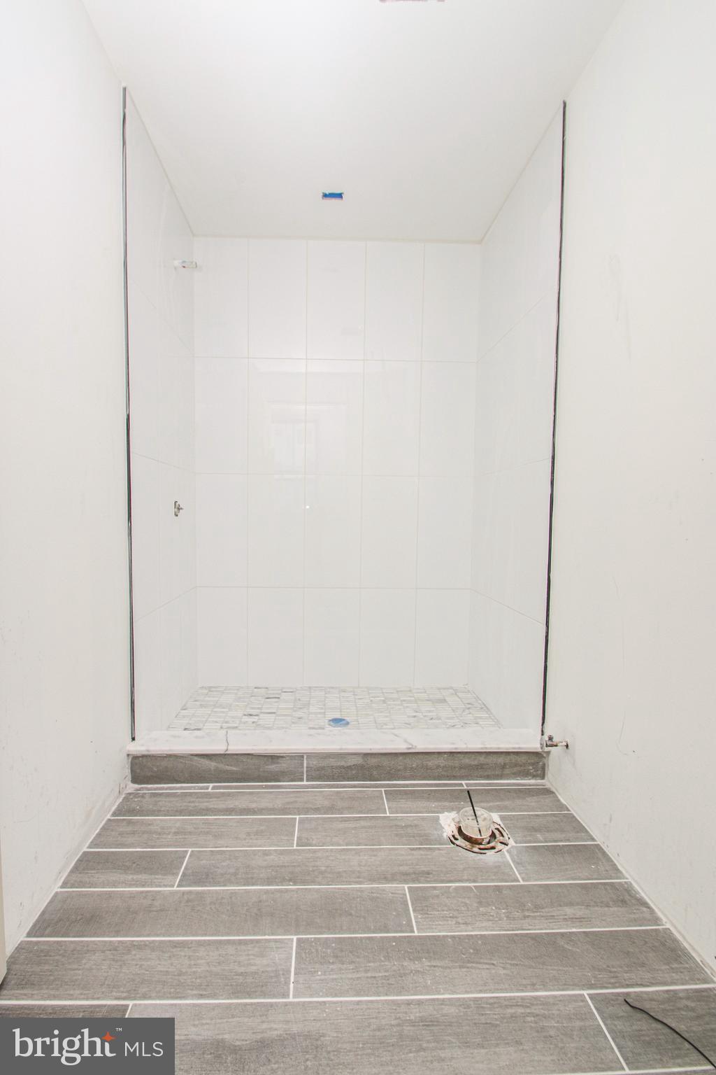 3945-49 Lancaster Avenue, Unit 3B Philadelphia, PA 19104 - Photo 6 of 28 a view of wooden floor