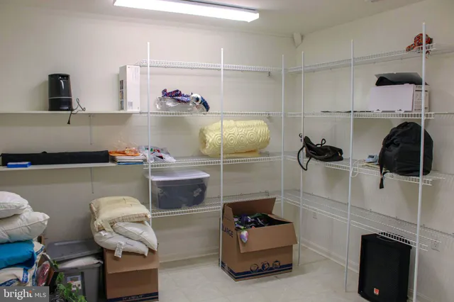 a room with a walk in closet and a window