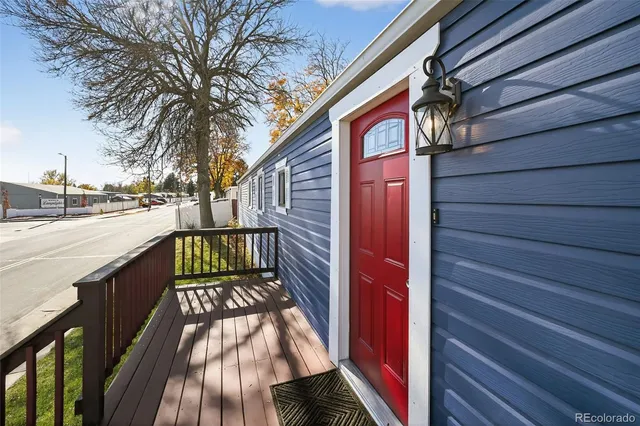 a view of balcony with wooden floor and outdoor space