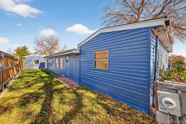 a brick building with a large window