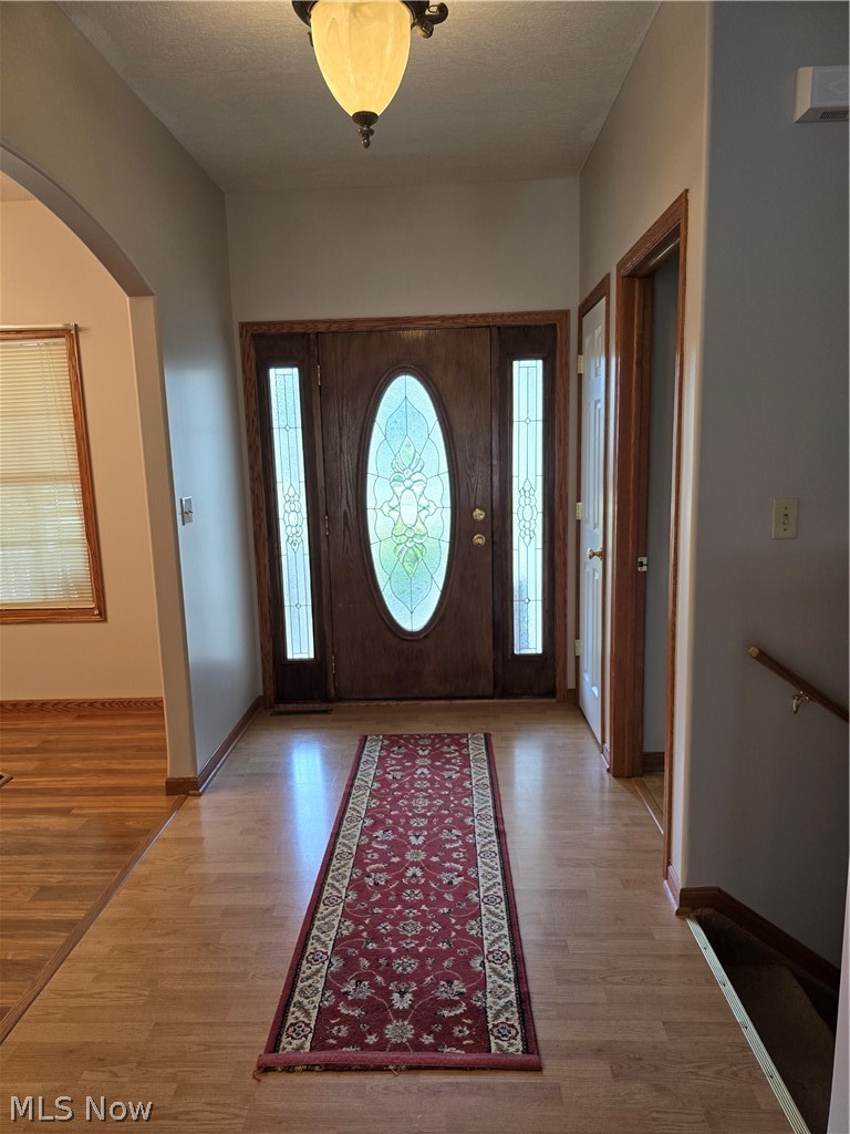 2680 Mayfair Road Akron, OH 44312 - Photo 2 of 25 Foyer entrance featuring hardwood / wood-style floors