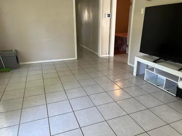 a view of a livingroom with bathroom