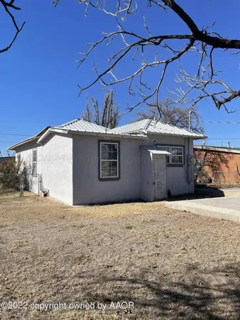 a front view of a house with a garage
