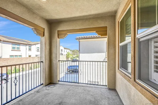 a view of a porch of a house