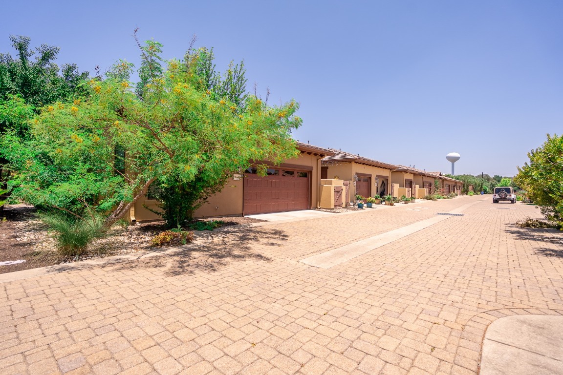 108-2 Rivalto Circle, Unit 5 Lakeway, TX 78734 - Photo 26 of 35 Attached 2-car garage