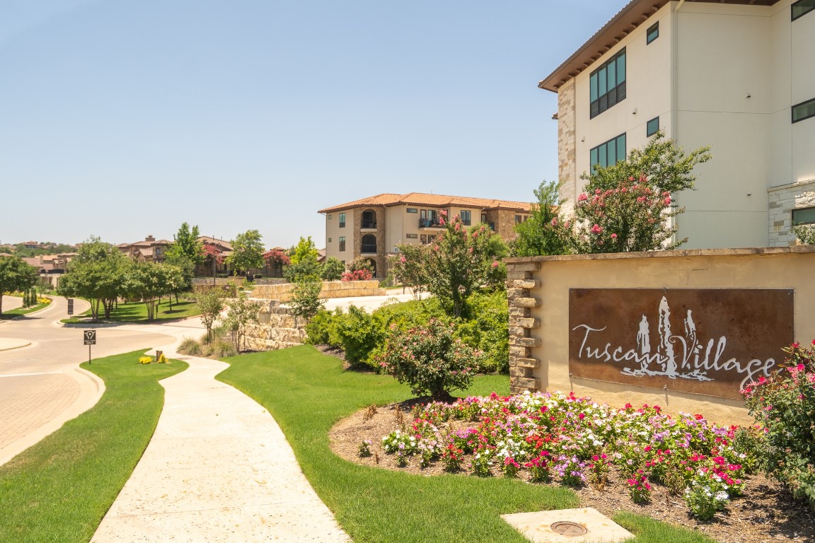 108-2 Rivalto Circle, Unit 5 Lakeway, TX 78734 - Photo 27 of 35 View of property's community with a yard