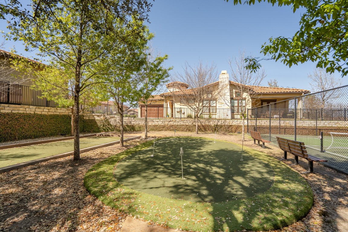 108-2 Rivalto Circle, Unit 5 Lakeway, TX 78734 - Photo 35 of 35 View of property's community featuring a putting green and a patio area