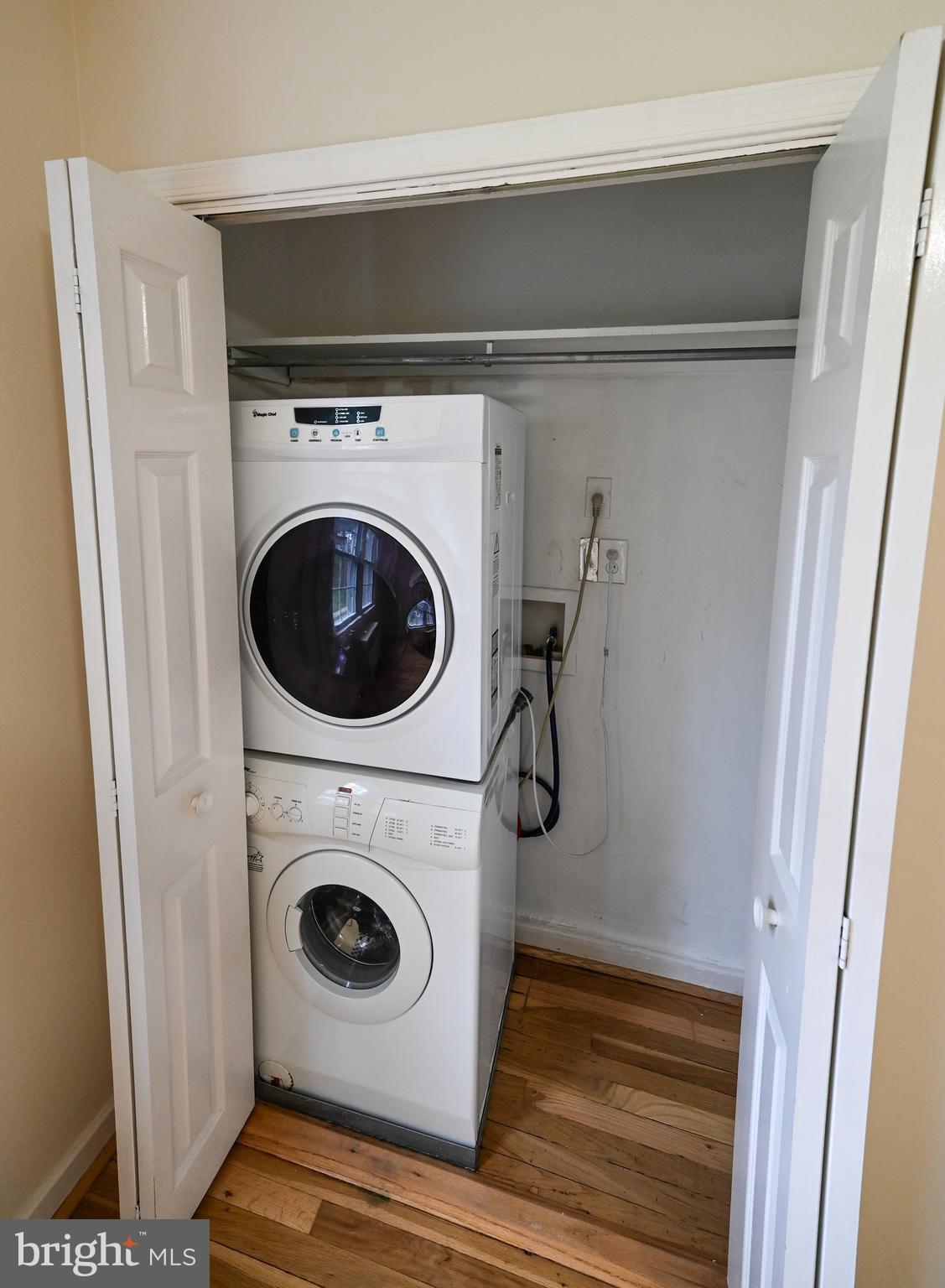 8331 Grubb Road, Unit G201 Silver Spring, MD 20910 - Photo 8 of 15 a utility room with dryer and washer