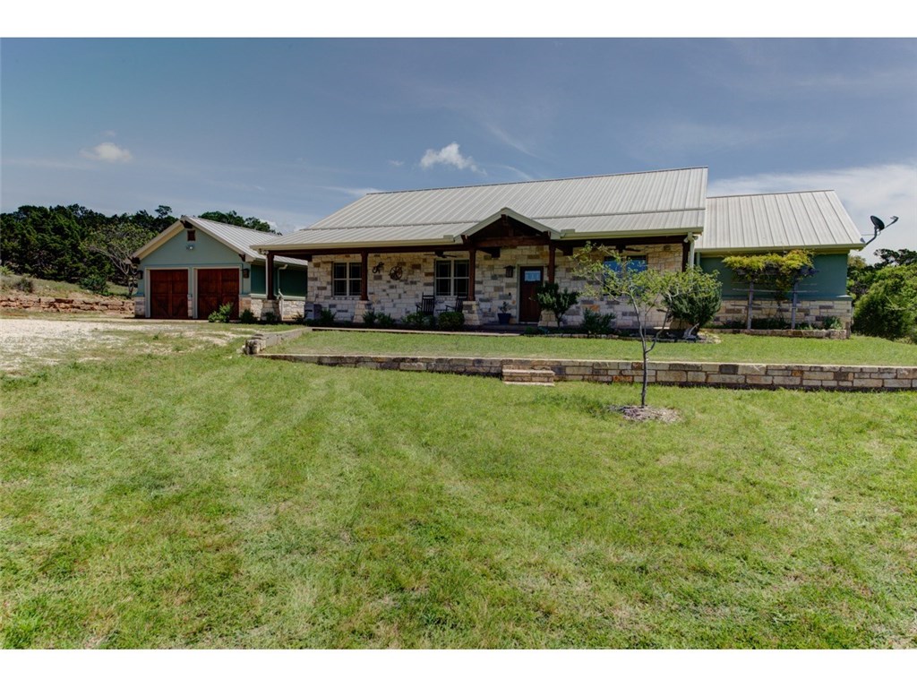 510 Old Red Ranch Road Dripping Springs, TX 78620 - Photo 1 of 1 a front view of a house with a yard