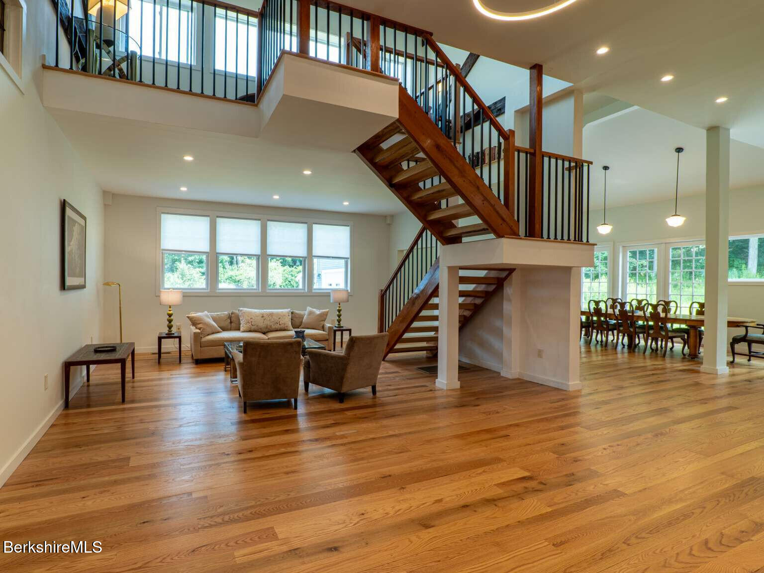 160 High Street Lee, MA 01238 - Photo 7 of 41 a dining room with furniture entryway and wooden floor