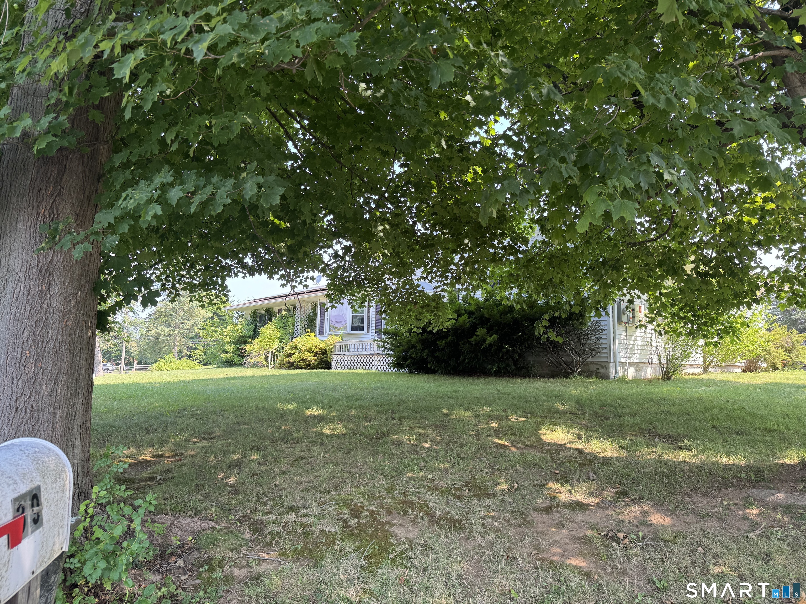 36 Pleasant View Road Derby, CT 06418 - Photo 2 of 20 a view of a yard with a house and large trees