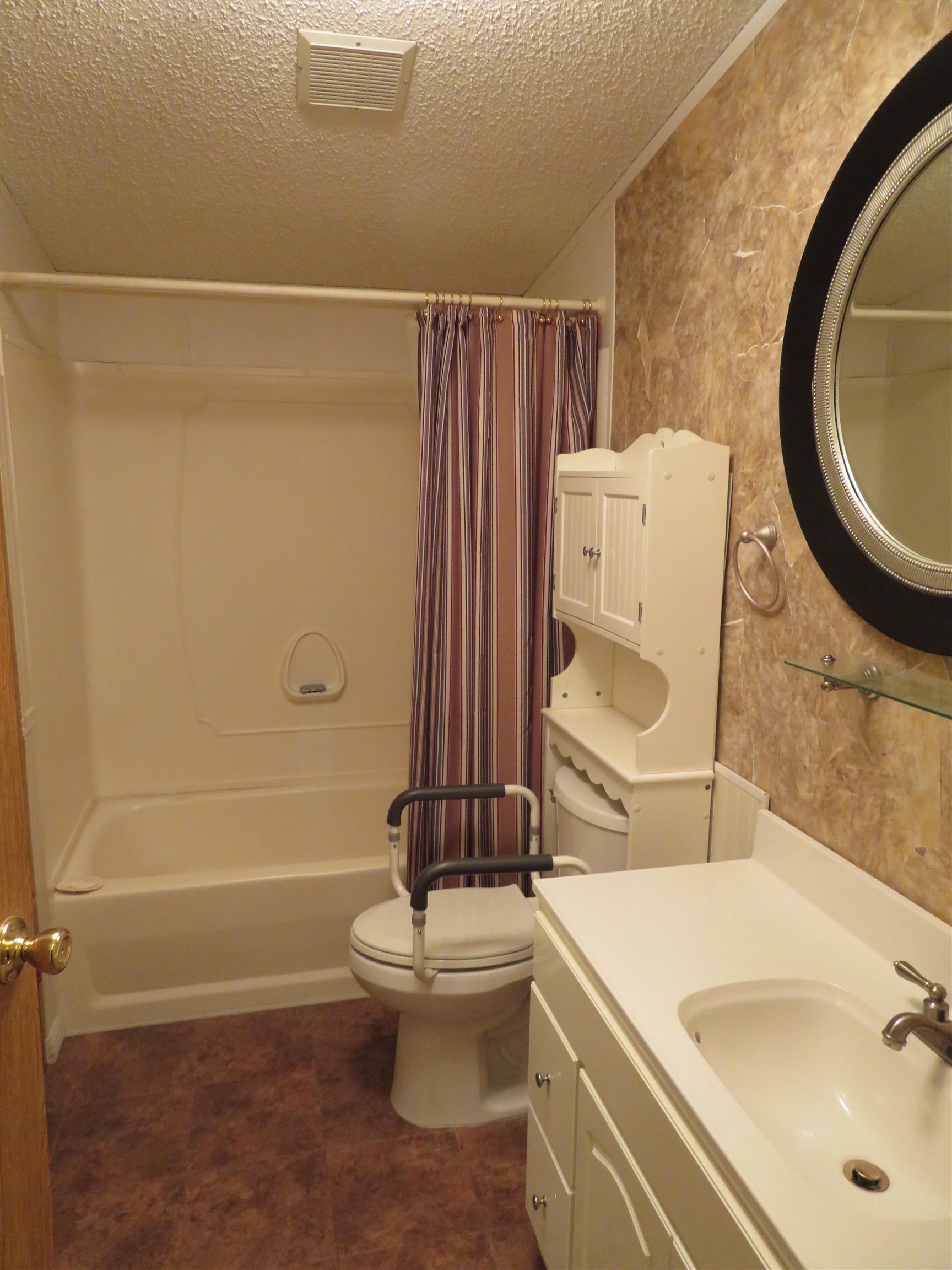435 32 Road, Unit 508 Clifton, CO 81520 - Photo 20 of 26 a bathroom with a sink a toilet and shower