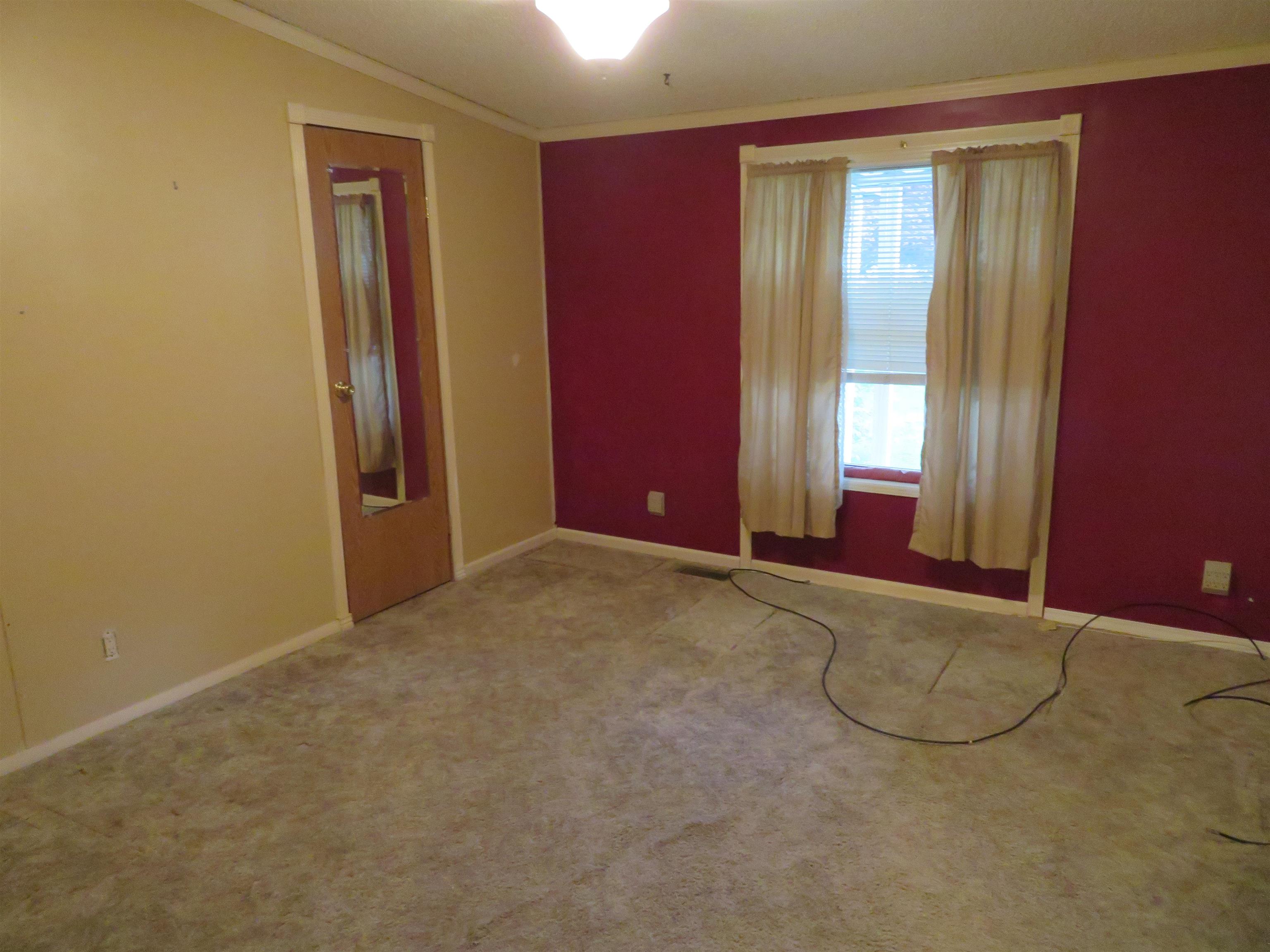 435 32 Road, Unit 508 Clifton, CO 81520 - Photo 23 of 26 an empty room with windows and closet