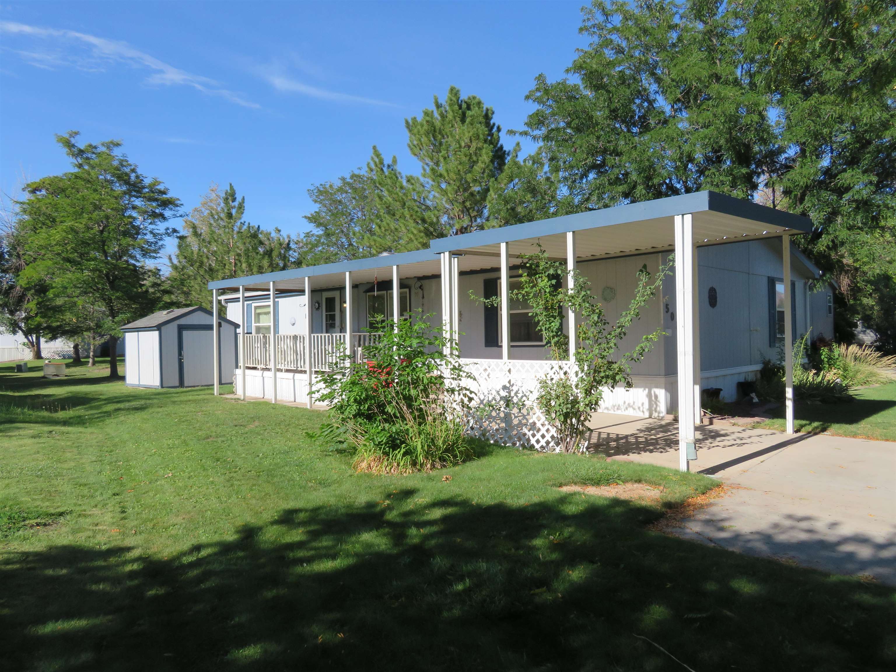 435 32 Road, Unit 508 Clifton, CO 81520 - Photo 26 of 26 a view of a house with backyard and garden