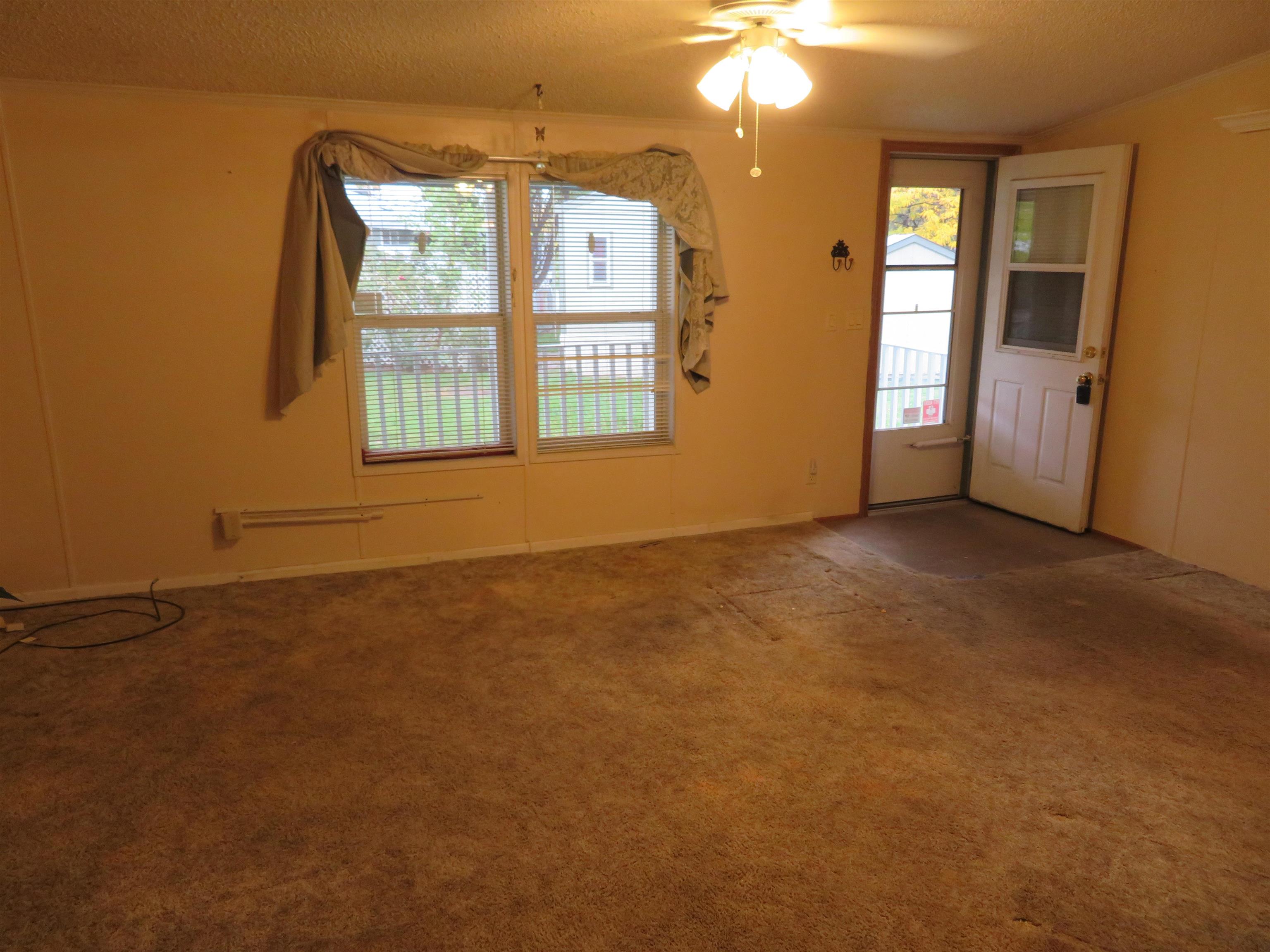 435 32 Road, Unit 508 Clifton, CO 81520 - Photo 5 of 26 an empty room with windows and closet